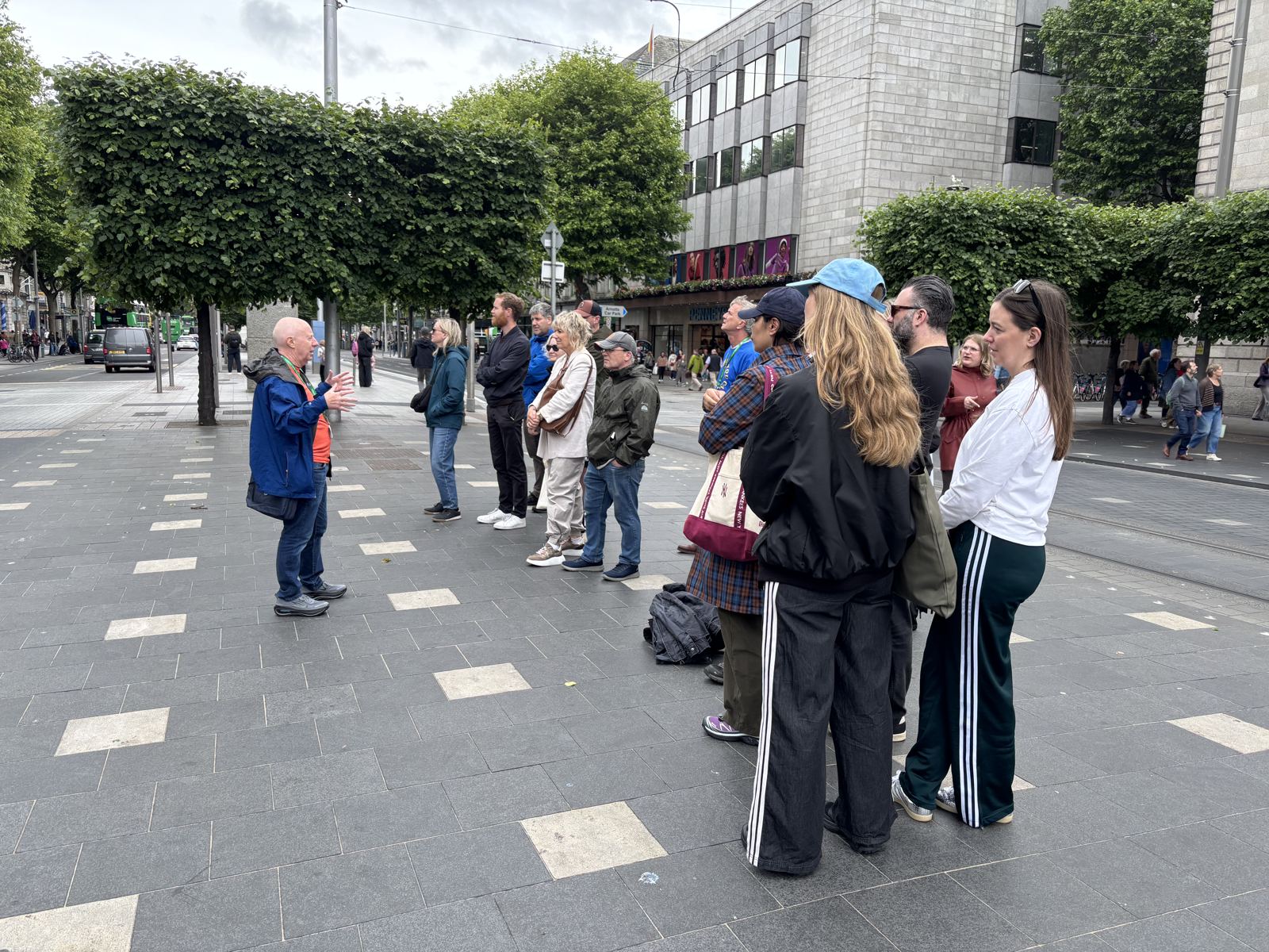 A group crossing a Dublin street